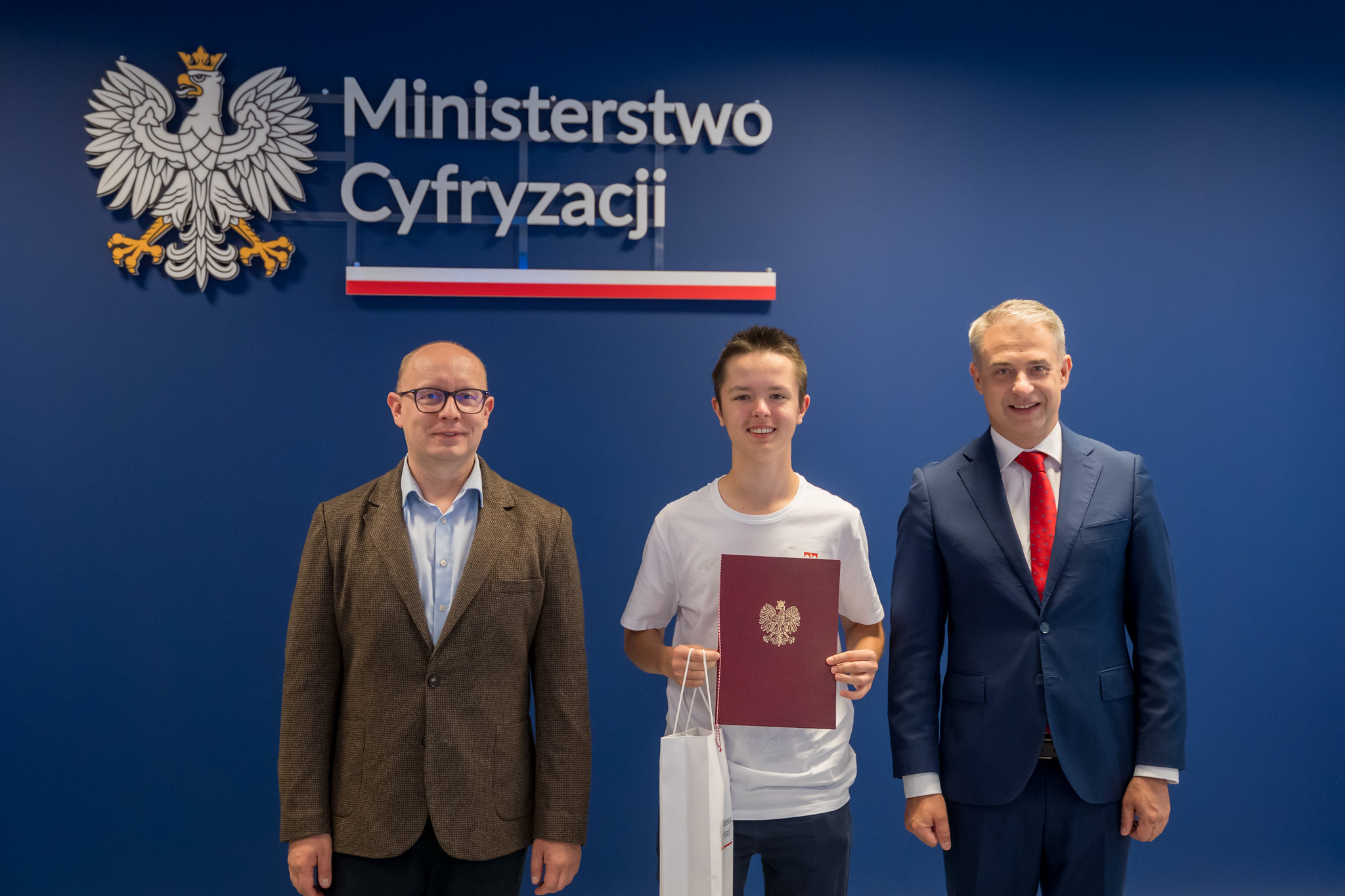 Michał Wolny z dr. inż. Radosławem Nielkiem i dr. Krzysztofem Gawkowskim.